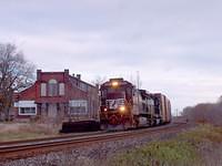NS 8800 Dash 9-40C - NS 1611 SD40, 10 cars leads 327 through Ingersoll Ontario 10-31-04 - note mismatched number boards
