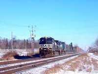 NS 9067 leads Conrail 8352 through Ingersoll Ontario 12-19-04