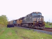 NS 9718 leads a UP unit and Conrail 8312 through Ingersoll on 327 9-8-04