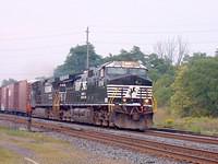 NS 9758 leads 328 with 32 cars through Ingersoll Ontario 8-26-04