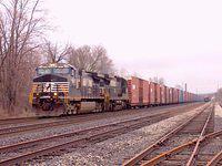NS 9803 leads a 32 car 327 past Ingersoll West Dundas Sub 4/1/04