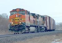 BNSF 4781 leads 327 through Ingersoll Ontario 3 bxs, 2 frame ,2 hoppers 3-16-05