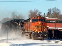 BNSF 5151 leads NS 3557 on 328 Ingersoll Ontario 2 frames, 6 hoppers, 30 cubes 3-3-06 08:50