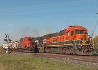 BNSF 8606 leads NS 2835 with about 40 cars on 328 Ingersoll Ontario 5-5-06