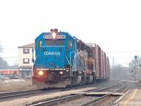 Conrail 5336 leads a WC unit on 327 through Ingersoll Ontario 3-28-05