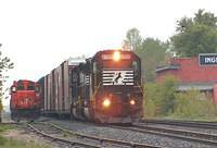 NS 6705 leads 328 through Ingersoll Ontario. VIA 70 is on the north track blocked by 328 5-16-06
