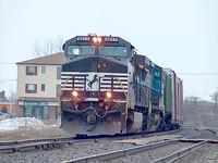 NS 327 with NS 9277 and Conrail 8415 and 65 cars crawls through Ingersoll Ontaio 3-19-05