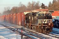 NS 9770 leads 328 with 23 cars through Ingersoll Ontario 07:52 3-4-06