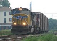 NS 327 lead by UP 4173 leads BNSF Warbonnet 910? through Ingersoll Ontario 6-18-06