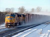 UP 5144 and a twin leads 328 through Ingersoll Ontario in the bright sun 12-03-05