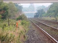 Looking west Dundas sub Mile 48.0 showing the climb out of Woodstock Note the trespasser 8-14-04
